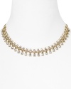 Find the chic in the chain with Carolee's glittering rhinestone-embellished bib. Wear this classic style to tastefully trim everything from tee shirts to evening gowns.