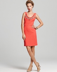 This delectable watermelon Milly dress flaunts an elegantly beaded neckline and trend-right nubby texture, making it a must-have investment piece this luxurious resort season.