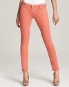 Beat the midweek style doldrums in these pretty-in-peach MICHAEL Michael Kors low rise skinny jeans.