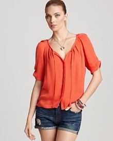 A lush Joie top boasts rich color, imbuing your look with trend-right style as the weather warms. Worn solo or under a jacket, the feminine look is oh-so chic--a worthy addition to your new-season wardrobe.