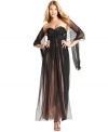 JS Collections' dramatic evening gown was designed with a sense of old Hollywood glamour. A sheer overlay and matching shawl make it easy to cast yourself in the part for the night!