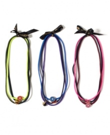 Simply charming. These lovely little accessories from Juicy Couture will dress your tresses in an assortment of signature charms, beads and unexpected ornaments. Presented in packs of three in a kaleidoscope of colors