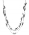 Layers of shining accents stack up classic style on Charter Club's four-row necklace. Finished with a toggle closure. Crafted in brushed silver tone mixed metal. Approximate length: 18 inches. Approximate drop: 1 inch.