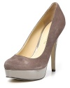 Patent platforms and heels lend sheen to these towering suede pumps for luxe-chic appeal. By Enzo Angiolini.