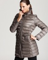 Moncler's Vanneau coat lends classic style in a timeless grey hue and practical mid-length. Princess seaming at the bust and back gives a flattering fit.