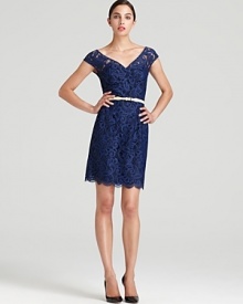 Delicate lace lends romantic inspiration to a classic Lilly Pulitzer dress, finished with cap sleeves and a scalloped hem for pure feminine charm.