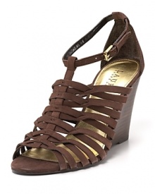 Inspired by gladiator silhouettes, the Damalise sandal from Lauren by Ralph Lauren boasts a strappy vamp and wedge heel.