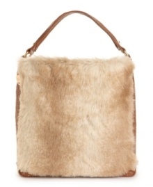 Fur-ociously trendy and detailed with antique goldtone studs, the Ginger tote perfectly marries now and then.