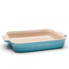 Ideal for cooking and serving, this durable stoneware dish features sure-grip handles for maximum portability. With low sides and a rectangular shape, it can be used in the oven, broiler or microwave for everything from lasagna to peach cobblers without absorbing flavors or odors.