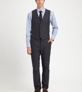 Add a finishing touch to a suit ensemble or a tailored structure to any casual look with this impeccably shaped, button-up vest, rendered in soft cotton for a handsomely modern feel.Button-frontWaist flap pocketsCottonDry cleanMade in USA