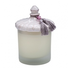 Floral notes of jasmine, gardenia, magnolia and honeysuckle are accented with a touch of rhubarb and black fig in this intoxicating candle. Made with premium wax and a luxurious 14% fragrance concentration, it is opulently housed in a frosted glass container with a fringed, ceramic top. Presented in a handsome charcoal box, trimmed with a bright shot of color, it makes a splendid gift, even to yourself.