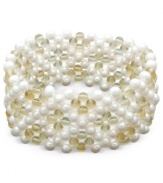 Total elegance. This beautiful cuff bracelet combines multiple rows of cultured freshwater pearls (4-5mm) with sunshine-hued citrine beads (60 ct. t.w.). Bracelet stretches to fit wrist. Approximate length: 7 inches.