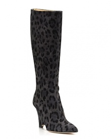 Leopard-printed suede balances atop a sleek notched wedge--what better boots for an urban safari? By kate spade new york.