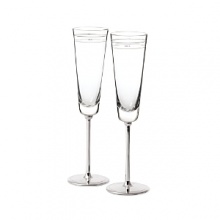 A perfect engagement or bridal shower gift, this set includes two champagne flutes- one etched with MRS and one etched with MR.