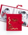 Personalize your tree and keep loved ones near with the photo album ornament from Holiday Lane. Featuring a dated cover and embroidered poinsettia motif in bold red.