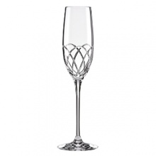 This kate spade new york Annadale champagne flute is rendered in sparkling European crystal cut with a swirled design.