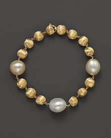 Softly-hued freshwater pearls mingle with textured beads of 18K yellow gold. Exclusively at Bloomingdale's from the Marco Bicego Africa Pearl Collection.