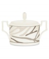 Abstract markings in soft shades of khaki fill in this glazed white china covered sugar bowl for unconventional elegance. Matte platinum bands and arched, geometric handles look sharp on casual and formal tables alike. From Noritake's collection of serveware and serving dishes.