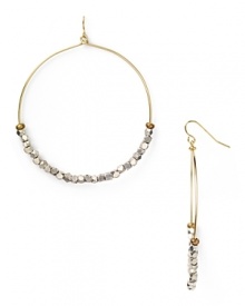 Work this season's exotic influences into your accessories collection with this pair of beaded hoop earrings from Vanessa Mooney, accented by an eclectic mix of silver nuggets.