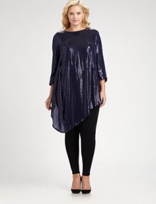 This silk top with allover sequins will move with you as its draped, asymmetrical hem provides a flattering and feminine silhouette.BoatneckThree-quarter sleevesAsymmetrical hemAllover sequinsConcealed back zipperFully linedAbout 35 from shoulder to hemSilkDry cleanImported