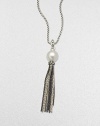 From the Midnight Pearl Collection. An elegant design featuring a lustrous white pearl with diamond accents and a two-tone, sterling silver box chain tassel. About 15-16MM white South Sea pearlDiamonds, .32 tcwSterling silver and blackened sterling silverLength, about 32Lobster clasp closureImported 