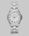 A classic design with a playful logo accented dial. Quartz movementWater resistant to 5 ATMRound stainless steel case, 36mm (1.4)Smooth bezelWhite dialLogo hour markersSecond hand Stainless steel link bracelet, 18mm wide (0.7)Imported