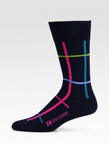 A bold, energetic grid pattern lends modern flair to this simple dress sock shaped in a soft cotton blend with a hint of stretch for maximum comfort and support.Mid-calf height80% cotton/18% polyester/2% elasticMachine washImported