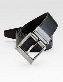 Sartorial sophistication in smooth leather with an engraved nickel buckle. About 1½ wide Leather Made in Italy 