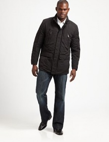 A lightweight, breathable mid-length jacket beats the wintry elements in style with a stand collar, a hidden snap-button placket and an adjustable waist for maximum comfort and support.Zip frontSnap-button placketStand collarZippered chest, waist flap pocketsAbout 31 from shoulder to hemPolyesterDry cleanImportedFur origin: China