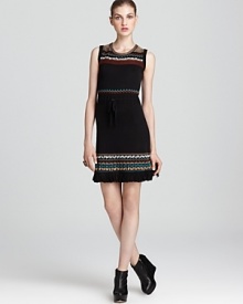 Fringe lends flair to this zig-zag knit Nanette Lepore dress with cinched drawstring waist.