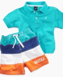 Sail on through in style. He'll get through the day comfortably in this cute polo and swim trunk set from Nautica.