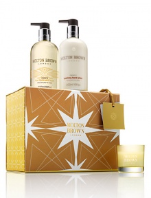 Jet off to the orange groves and delight in our bestselling festive gift for home and hands. Lively. Zesty. Irresistible. Set includes: Naran Ji Fine Liquid Hand Wash, 10 oz.; Naran Ji Soothing Hand Lotion, 10 oz. and Naran Ji Mini Candle 30g: to make your home smell unmistakably Molton Brown. Made in England. 