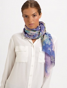 A vivid, wild flower watercolor print adorns this silk and cashmere wrap.55% cashmere/45% silkAbout 28 X 80Dry cleanImported