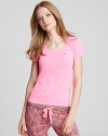 Wake up energized with this neon pink Love Yourself tee from Juicy Couture.