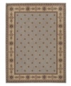 Elegant and refined, this distinctive collection is speckled with blossoms and bordered with vines in an understate palette of warm, neutral tones. Bearing the rich patina of premium-quality Opulon(tm) yarns, each rug boasts a densely woven and strikingly luxurious pile that's a pleasure to touch and admire. One-year warranty.