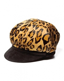 Go for a fierce style in an animal printed newsboy hat with contrast black brim.