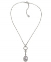 Definitely dazzling! Sparkling rhinestones combine with glittering glass accents on this stunning pendant necklace from Carolee. Set in silver tone mixed metal, it'll be sure to attract attention whenever you wear it. Approximate length: 16 inches + 2-inch extender. Approximate drop: 2-1/4 inches.