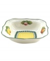 A contemporary shape with a classic pattern, the square individual bowl from Villeroy & Boch's French Garden collection of dinnerware and dishes has a summery fruit pattern with a pale yellow center and green trim.