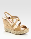 EXCLUSIVELY AT SAKS. Leather criss-cross design with cork wedge and espadrille platform. Cork and hemp wedge, 4 (100mm)Cork and hemp platform, 1 (25mm)Compares to a 3 heel (75mm)Leather upperLeather liningRubber solePadded insoleImported