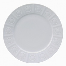 Modern in design with a raised circular pattern, made from French Limoges Porcelain. Dishwasher and microwave safe.