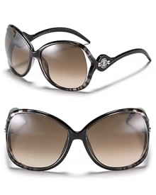 Turn heads in glamorous oversized zebra print sunglasses with logo accented open temples.