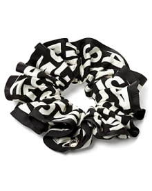 Accent a stylish bun or flowing ponytail with a playful printed scrunchie from MARC BY MARC JACOBS.