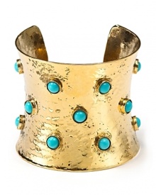 Royal richness for downtown girls. This hammered cuff features a wide size and gorgeous turquoise stones for a chic choice with cocktails.