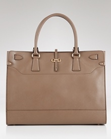 Salvatore Ferragamo's supple leather tote features a sharply structured design. Ideal with daytime looks, this go-anywhere bag is oh so chic with both dresses and jeans.