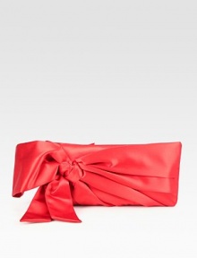 A truly feminine style with a large satin bow front.Top zip closureSatin lining9W X 4½H X 1½DMade in Italy