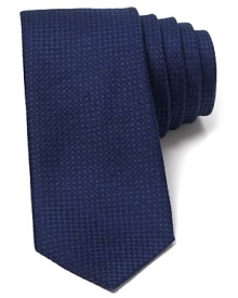 Knot this tonal tie for a dapper look that suits the summer and can be worn all year round, too.