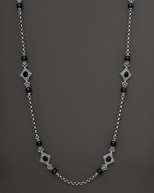 Faceted black onyx blooms along an intricate sterling silver chain. By Konstantino.