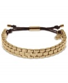 Watch out for sleek style. This adjustable bracelet from Michael Kors sports a linked, watch-inspired design. Adjustable with silk cord. Crafted in gold tone mixed metal. Approximate diameter: 2 to 2-1/2 inches. Approximate width: 1/3 inch.