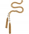 Add a chic edge to every outfit with R.J.Grazianos tasseled rope necklace, a fantastically fresh take on this classic style - Rope textured surface, silver-toned bar and pav?-set crystallized ball charms - Wear with tailored cocktail sheaths, or over cashmere pullovers with favorite skinnies and flats