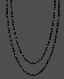 Polish and shine for miles! This long, onyx (5-6 mm and 7-8 mm) strand necklace adds elegance in layers and unique contrast to any look. Approximate length: 64 inches.